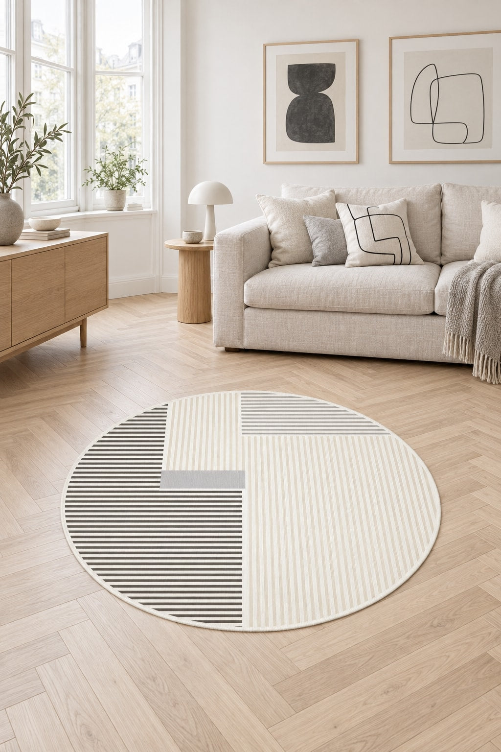 Striped Modern Round Area Rug – Gray in a living room