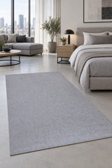 Abstract Boho Area Rug – Gray in a bedroom