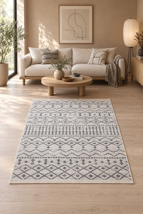 Abstract Boho Area Rug – Gray & Cream in a living room