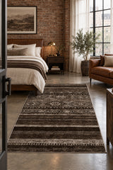Abstract Ethnic Area Rug – Brown in a bedroom