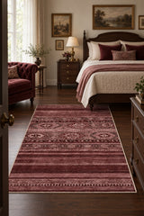 Abstract Ethnic Area Rug – Burgundy in a bedroom