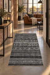 Abstract Ethnic Area Rug – Gray in a hallway