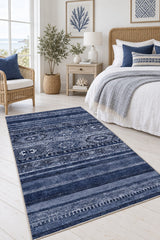 Abstract Ethnic Area Rug – Navy in a bedroom