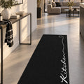 Abstract Modern Kitchen Rug – Black in a hallway