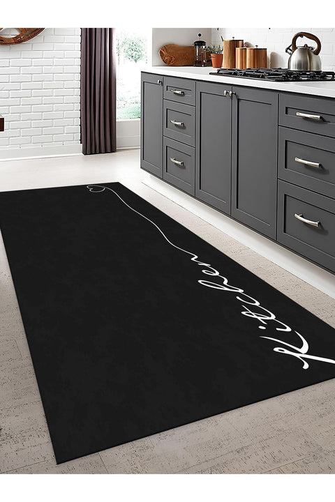 Abstract Modern Kitchen Rug – Black in a kitchen