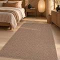 Abstract Natural Jute Area Rug in a bedroom