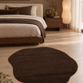 Amorphous Modern Shag Area Rug in a bedroom