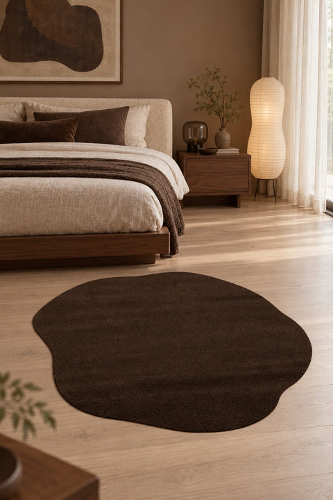 Amorphous Modern Shag Area Rug in a bedroom