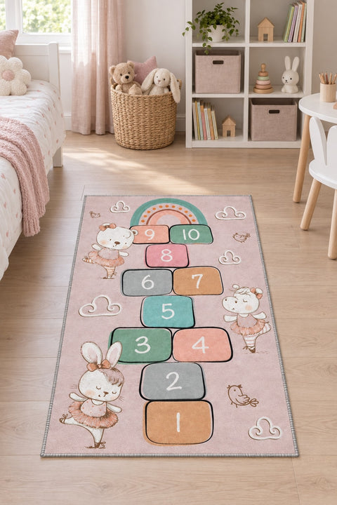 Ballerina Hopscotch Kids Area Rug in a nursery