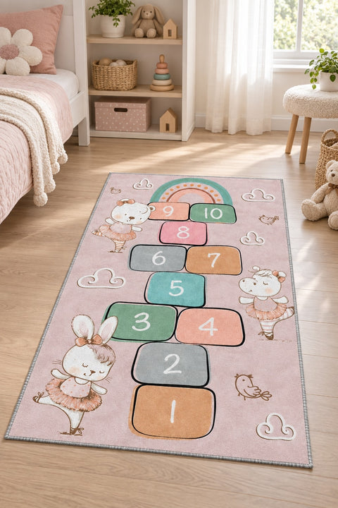 Ballerina Hopscotch Kids Area Rug in a nursery