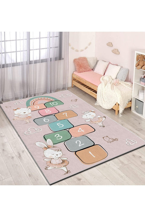 Ballerina Hopscotch Kids Area Rug in a nursery