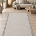 Border Modern Kitchen Rug – Charcoal & Ecru in a living room