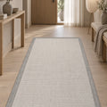 Border Modern Kitchen Rug – Charcoal & Ecru in a hallway