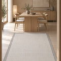 Border Modern Kitchen Rug – Charcoal & Ecru in a dining room