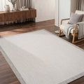 Border Modern Kitchen Rug – Charcoal & Ecru in a living room