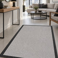 Border Modern Kitchen Rug – Ecru & Black in a hallway