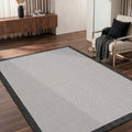 Border Modern Kitchen Rug – Ecru & Black in a living room