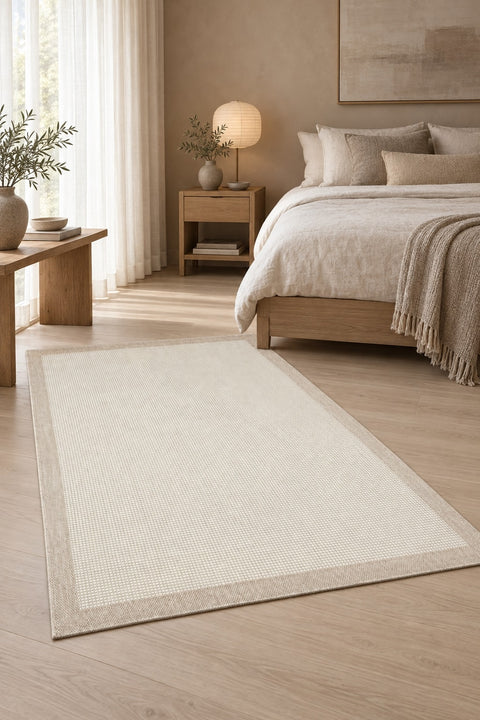 Bordered Modern Kitchen Rug – Beige & Cream in a bedroom