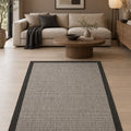 Bordered Modern Kitchen Rug – Black in a living room