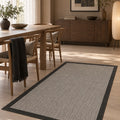 Bordered Modern Kitchen Rug – Black in a dining room
