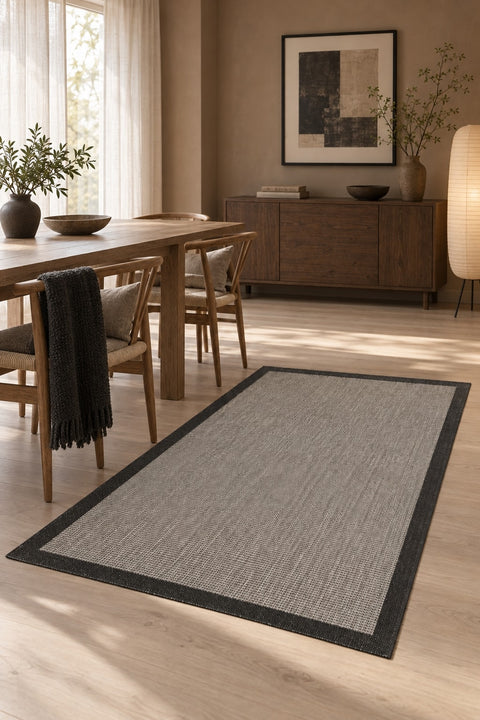 Bordered Modern Kitchen Rug – Black in a dining room