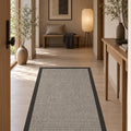Bordered Modern Kitchen Rug – Black in a hallway