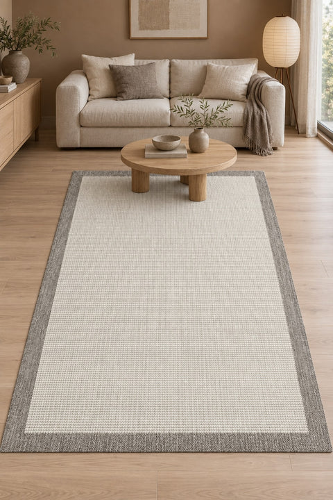 Bordered Modern Kitchen Rug – Cream & Gray in a living room