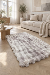 Bubble Checkered Boho Area Rug – Pink & Cream in a living room