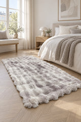 Bubble Checkered Boho Area Rug – Pink & Cream in a bedroom