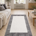 Clean Modern Area Rug in a living room