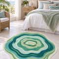 Digital Print Round Area Rug – Green in a bedroom
