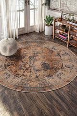 Distressed Vintage Round Rug – Brown in a living room