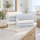 Dotted Cotton Guest Towel Set of 6 – Blue & Ecru in a bathroom