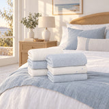 Dotted Cotton Guest Towel Set of 6 – Blue & Ecru in a bedroom
