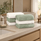Dotted Cotton Guest Towel Set of 6 – Green & Ecru in a bathroom