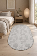 Emboss Boho Oval Rug in a bedroom