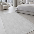 Embossed Modern Area Rug in a bedroom