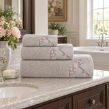 Embroidered Cotton Bath Towel Set of 3 – Beige in a bathroom