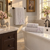 Embroidered Cotton Bath Towel Set of 3 – Beige in a bathroom