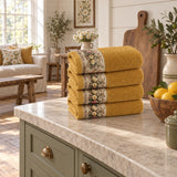 Floral Border Cotton Kitchen Towel Set of 4 – Mustard in a kitchen