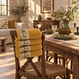 Floral Border Cotton Kitchen Towel Set of 4 – Mustard in a dining room