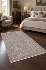Frezia Floral Vintage Area Rug in a bedroom