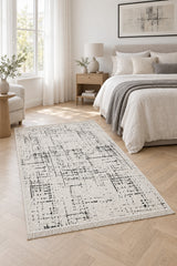 Geometric Boho Area Rug – Cream in a bedroom