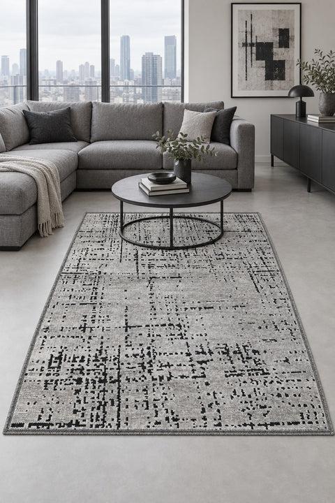 Geometric Boho Area Rug – Gray in a living room