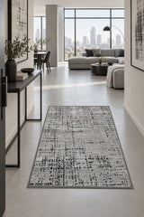 Geometric Boho Area Rug – Gray in a hallway