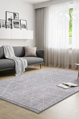 Geometric Boho Area Rug – Gray in a living room