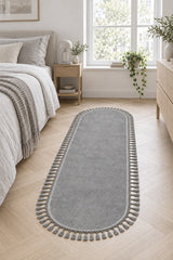 Geometric Boho Oval Rug in a bedroom