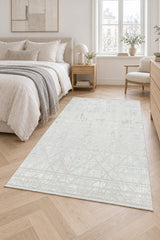 Geometric Modern Area Rug – Beige in a bedroom