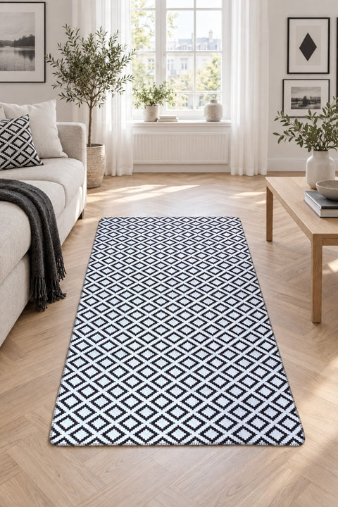 Geometric Modern Kilim Area Rug – Black in a living room