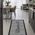 Geometric Modern Kitchen Rug – Black in a dining room